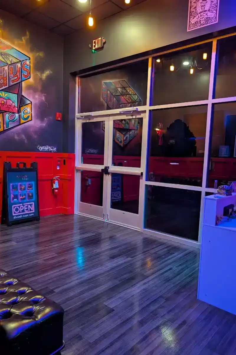 Team solving puzzles inside escape room in Gainesville, Florida